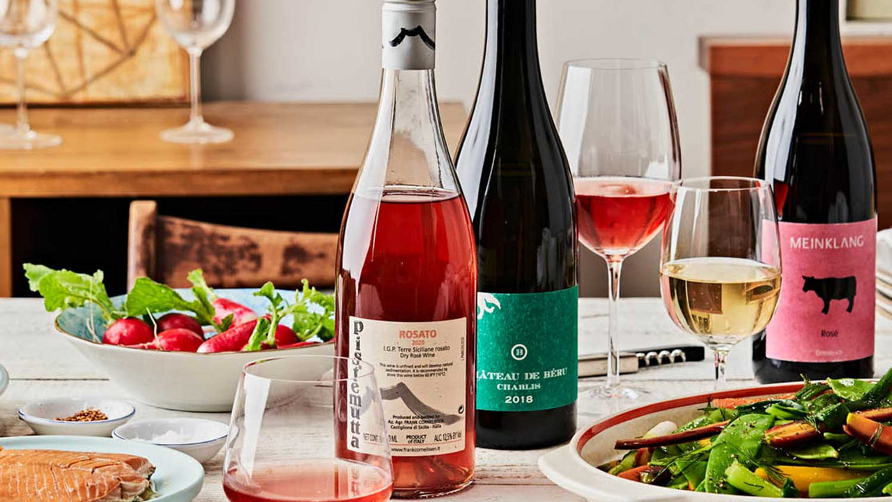 A holiday table is set with platters of food and wine from Patagonia Provisions