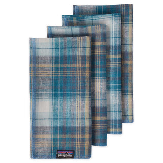 A set of four Patagonia recycled cloth napkins in a blue plaid