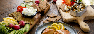 Gluten-free breadfruit crackers paired with smoked salmon, tinned mussels, fresh crunchy vegetables and creamy cheeses—all gluten free