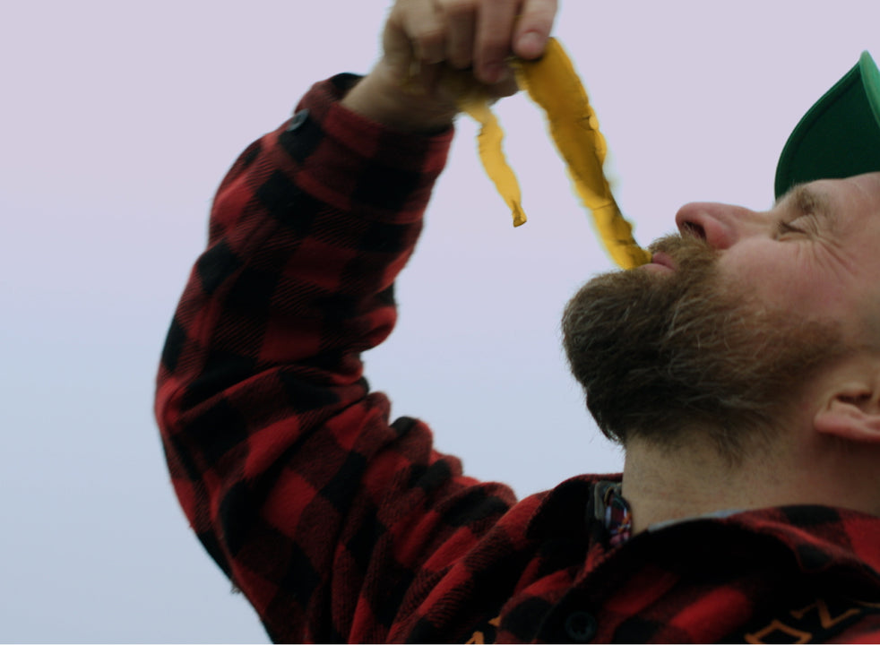 Man Eating Kelp in red flannel