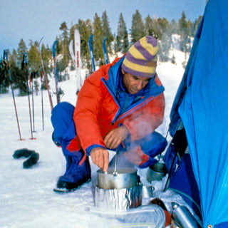 Yvon Chouinard boiling up the tsampa in the Beartooth Mountains, Montana. Photo by Rick Ridgeway