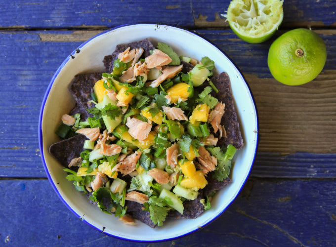 An enamel bowl is filled with Patagonia Provisions Smoked Salmon ceviche