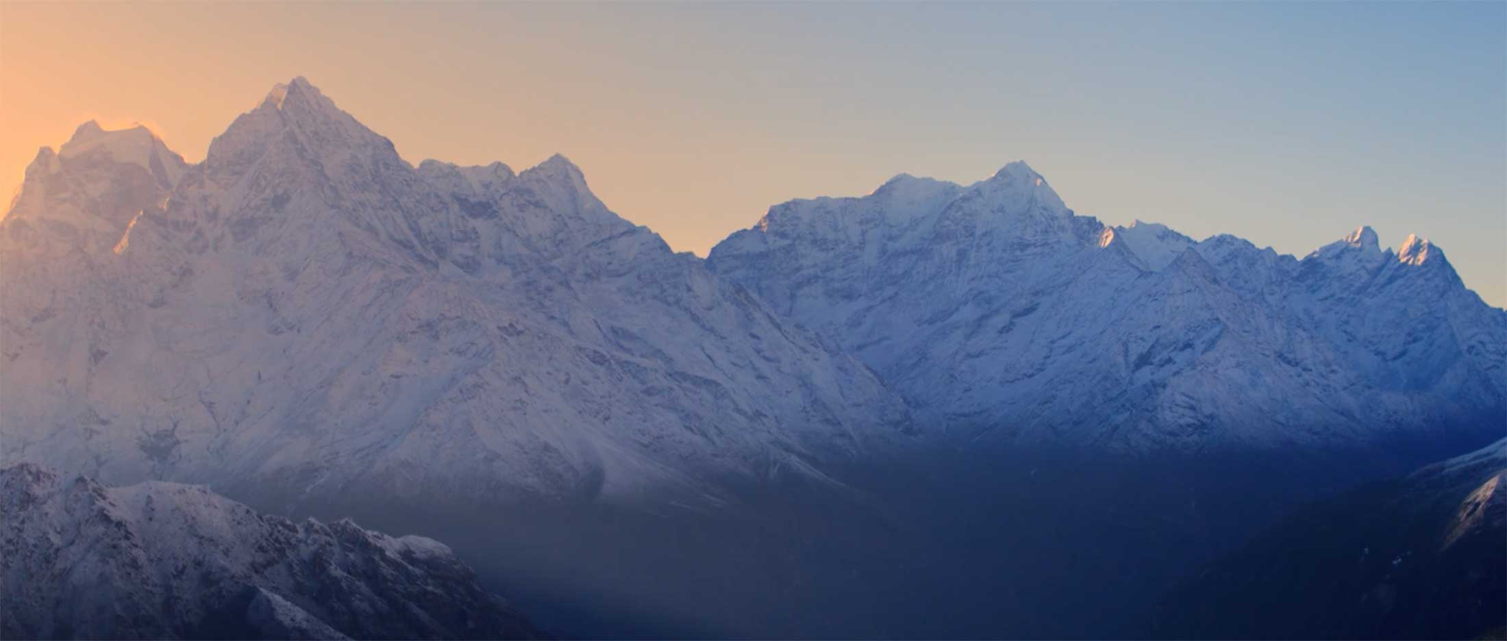 Intro screen for Patagonia Provisions Tsampa Soup movie showing blue hazy mountains